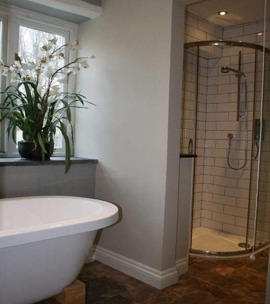 a picture of a freestanding bath and a freestanding shower
